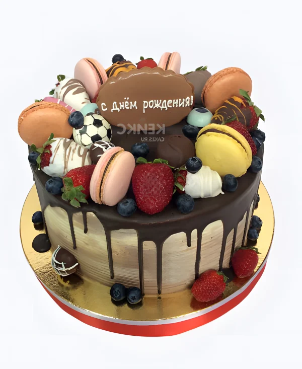 Золотой торт с макарунс Фото