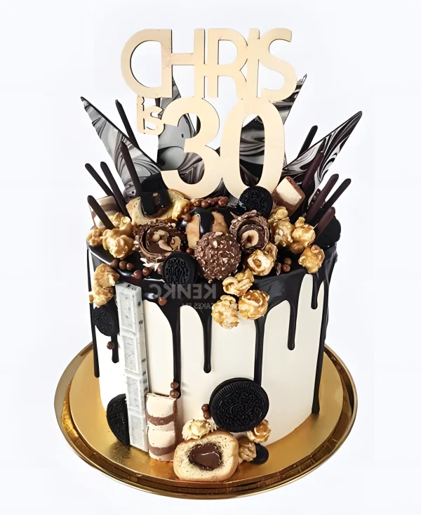 Торт с черной глазурью и золотыми цифрами Фото