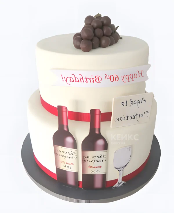 Двухъярусный торт с вином и бокалом Фото
