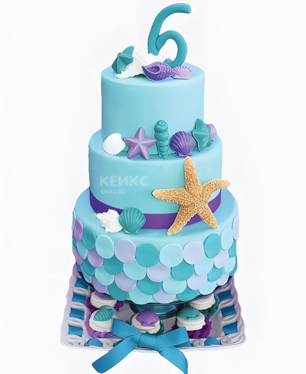 Голубой торт с морскими звездами Фото