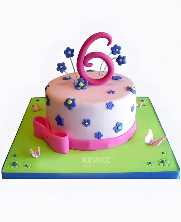 Торт розовый с синими цветочками Фото