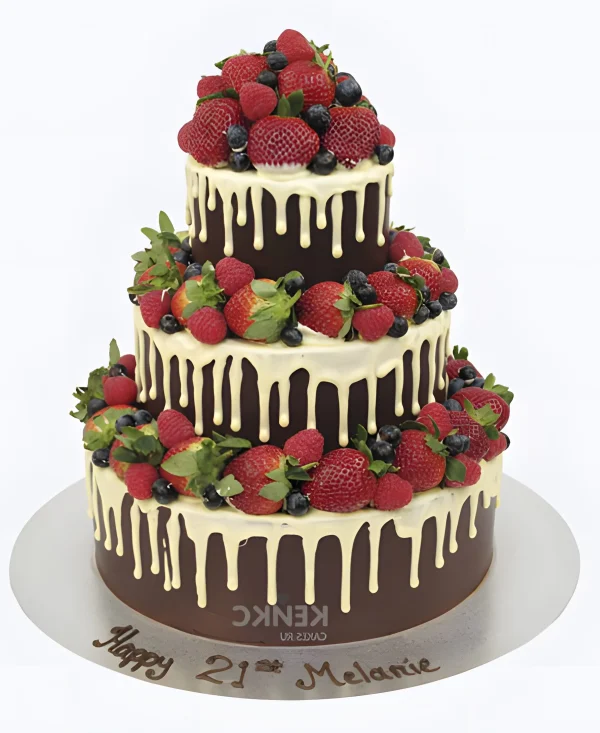 Торт двухъярусный с фруктами и подтеками Фото