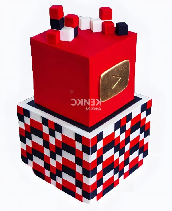 Оригинальный торт в виде квадратов с золотым значком Фото