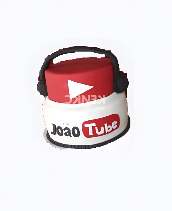 Красно-белый торт с черными наушниками Фото