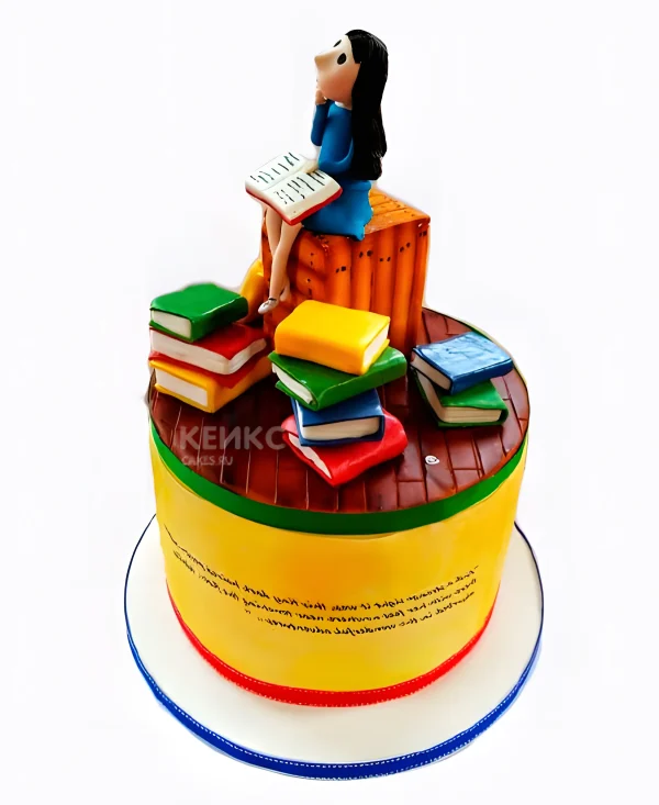 Яркий торт с девушкой и книгами Фото