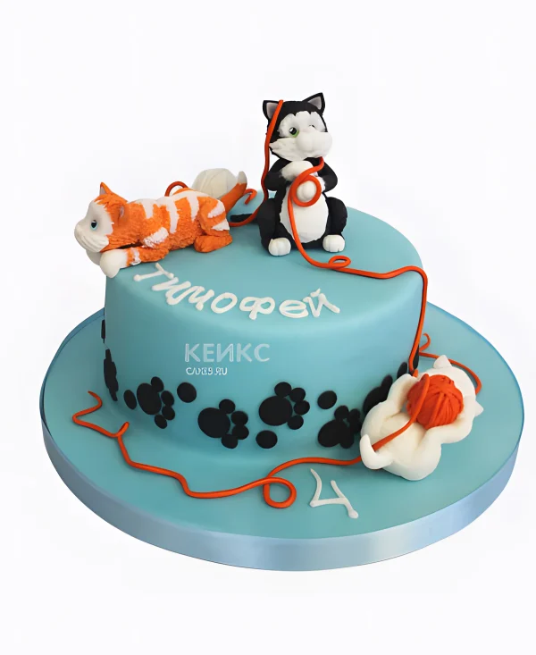 Голубой торт с кошками и нитками Фото