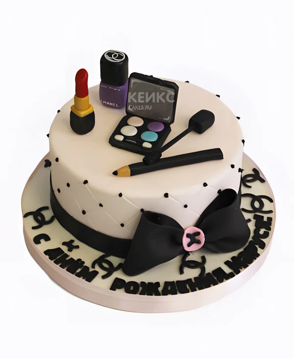 Белый торт с черным бантом и косметикой Фото