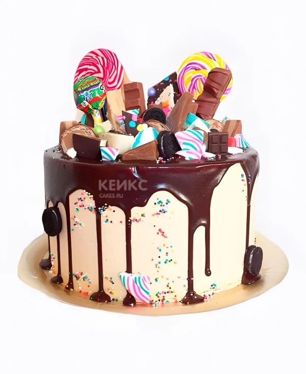 Торт с шоколадными потеками и разноцветными сладостями Фото