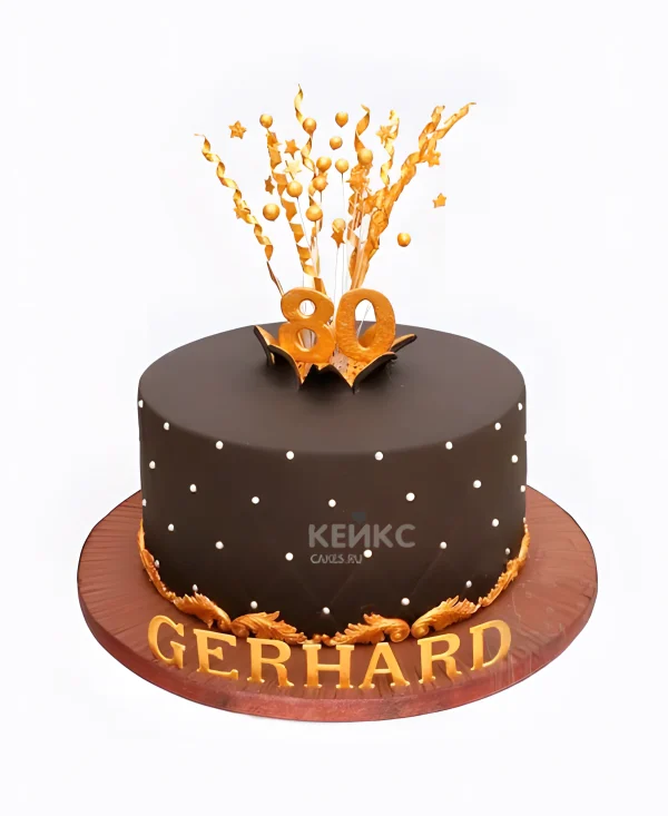 Шоколадный торт с бусинками и золотым украшением Фото