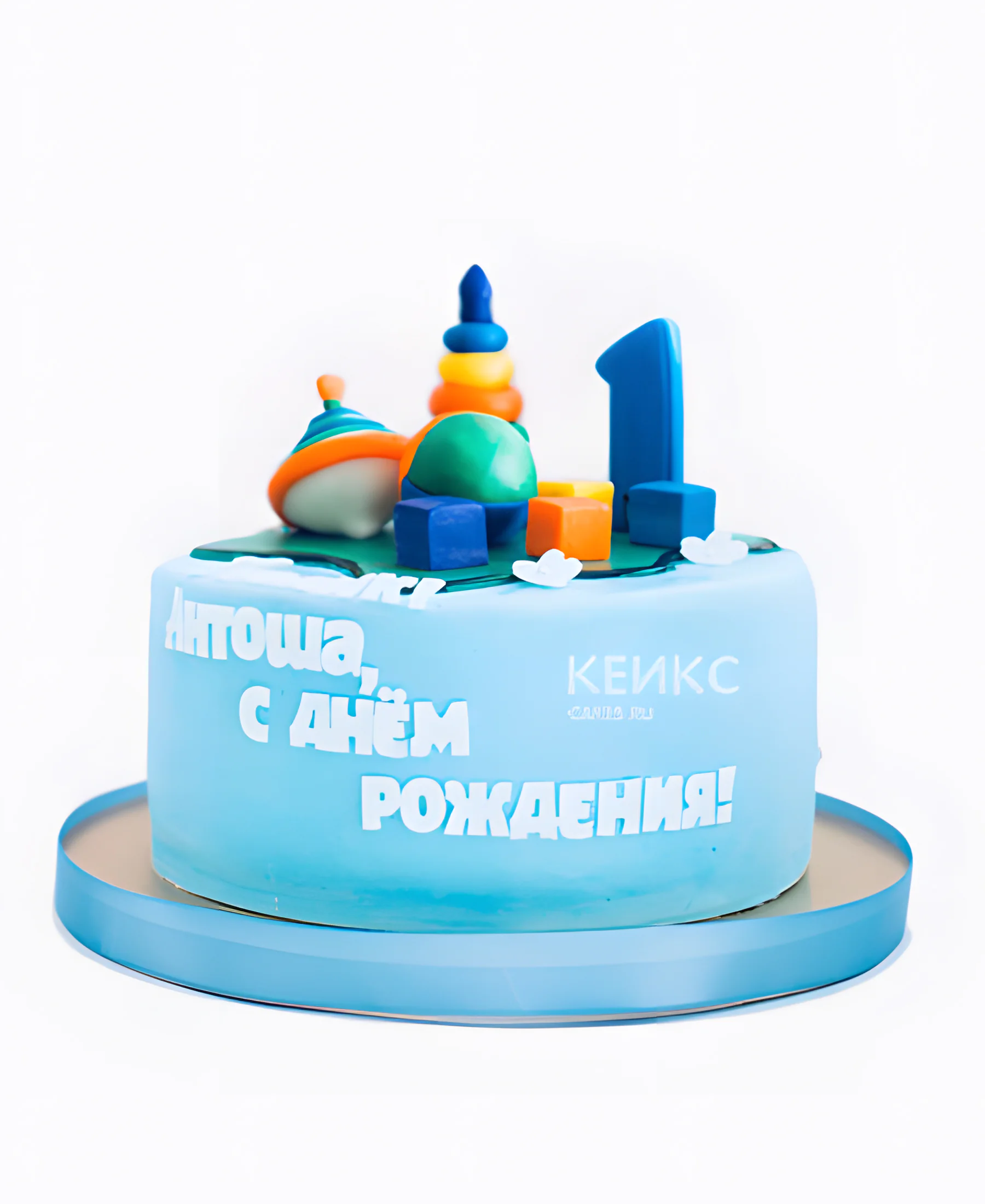 Торт синего цвета и игрушками Фото