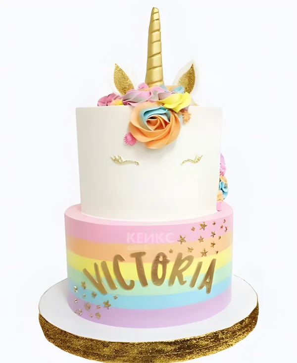 Разноцветный торт в виде единорога Фото