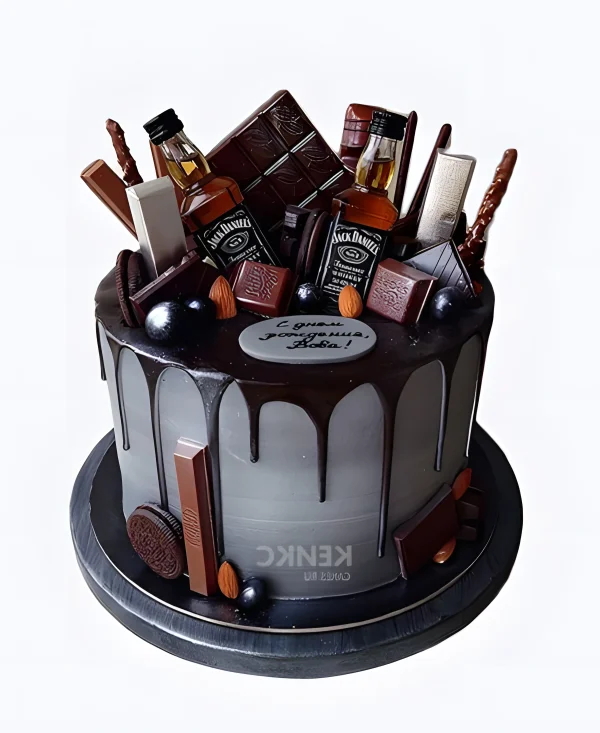 Торт с шоколадом и бутылочками виски Фото