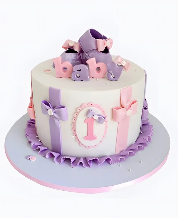 Торт с фиолетовыми башмачками и бантиками Фото