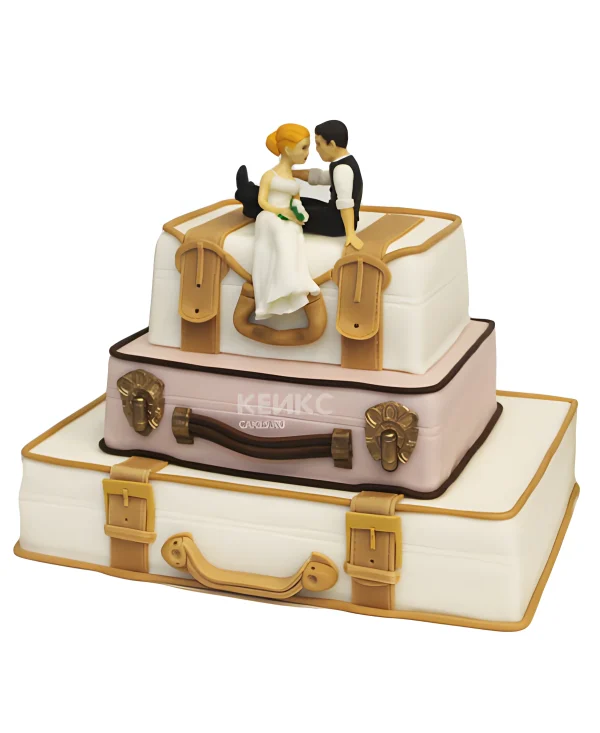 Оригинальный торт с фигурками жениха и невесты на чемоданах Фото