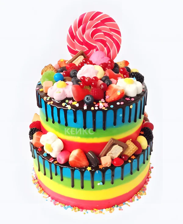 Яркий радужный торт для девочки с леденцами Фото