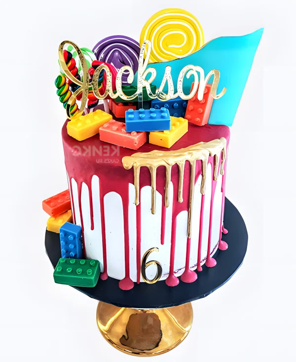Торт для мальчика с леденцами и яркой глазурью Фото