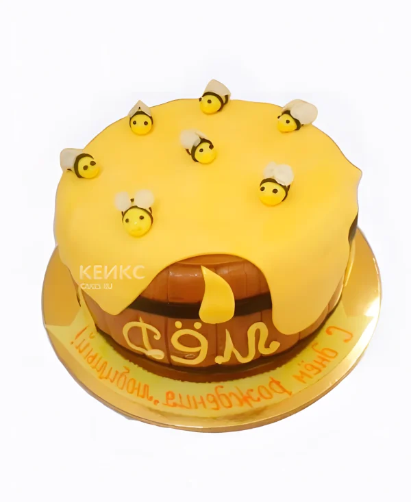 Желтый торт с сотами и пчелами Фото