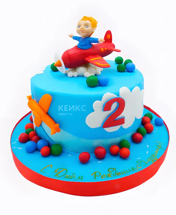Голубой торт с самолетами и летчиком Фото