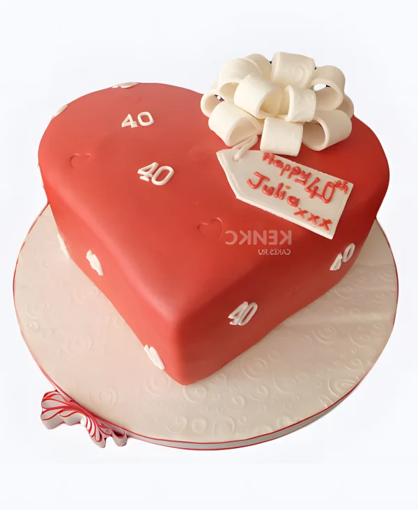 Торт в виде сердца с бантом Фото