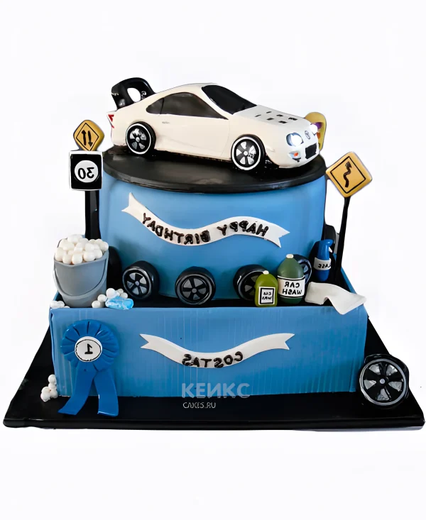 Синий двухъярусный торт с машиной тойота и надписью Фото