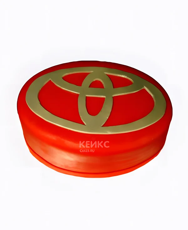 Красный торт с логотипом тойоты Фото