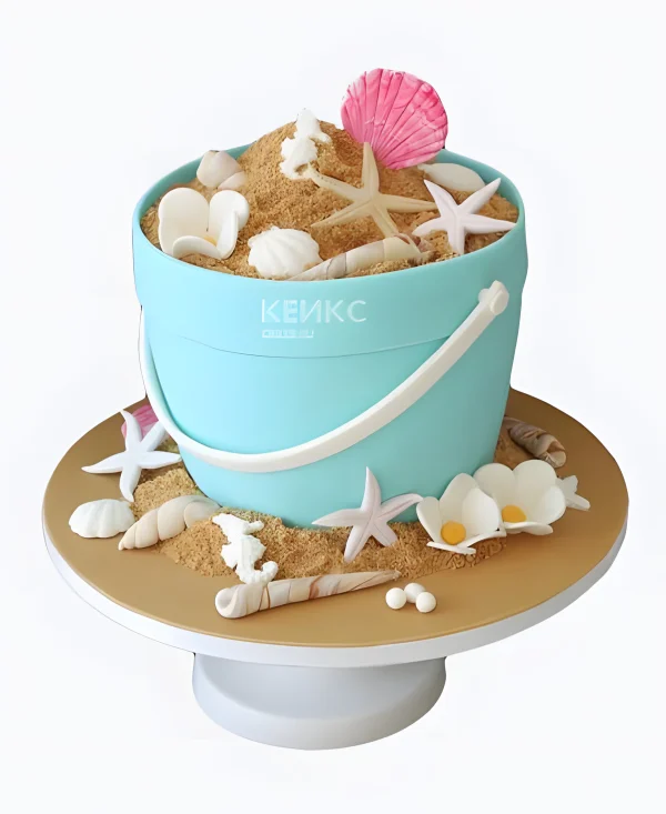 Торт в виде ведерка с песком и ракушками Фото
