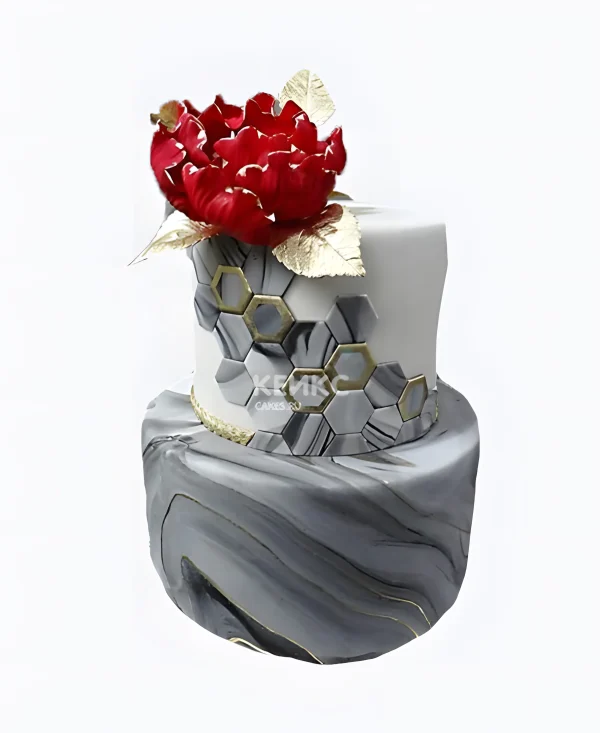 Красивый серый торт с красным украшением Фото