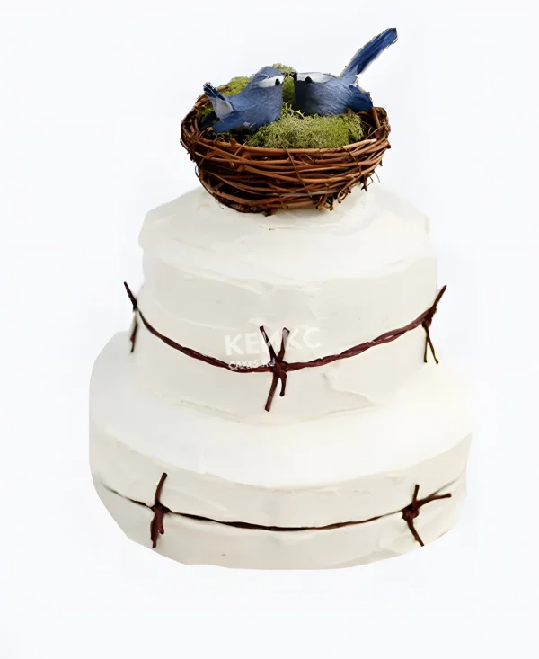 Свадебный торт с птичками в гнезде Фото