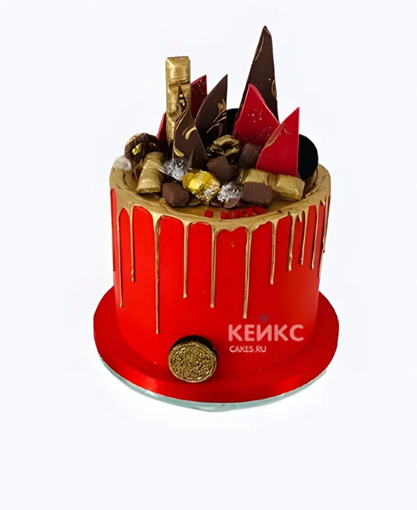 Красный торт с золотыми подтеками и шоколадом Фото
