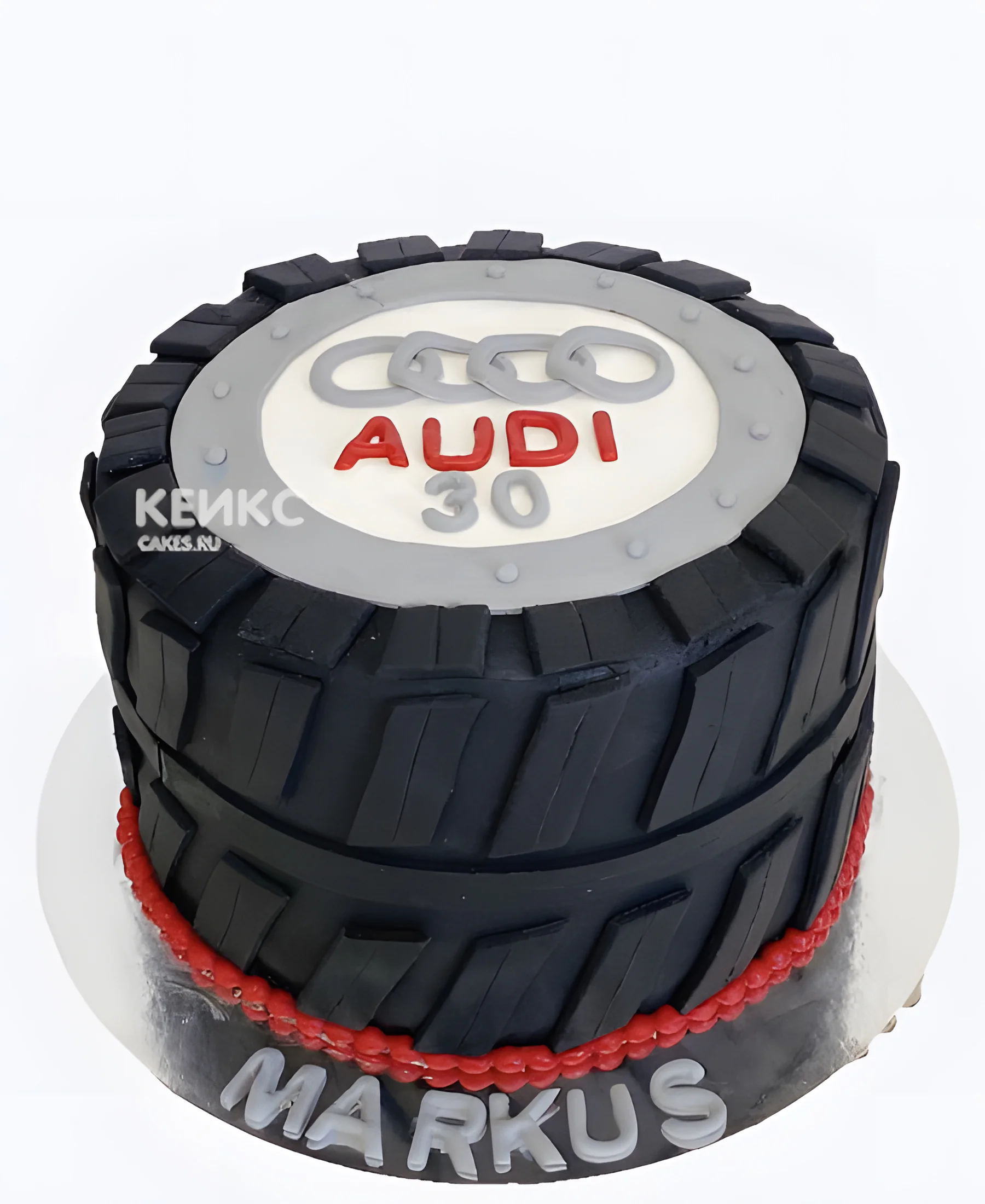 Торт Ауди в виде черного колеса Фото