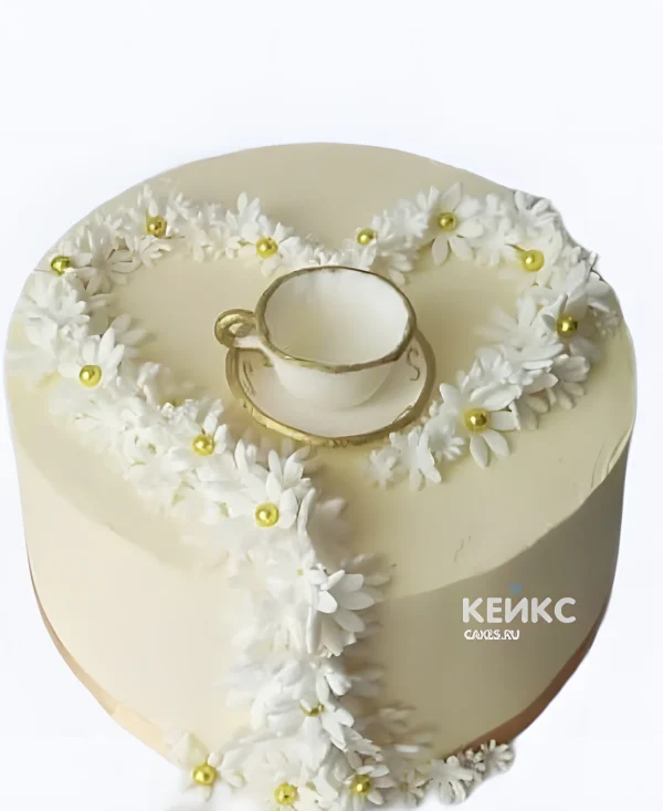 Торт на фарфоровую свадьбу с ромашками и чашкой Фото