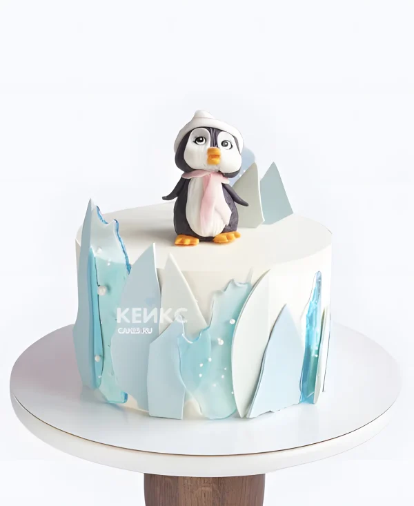 Торт пингвин и снежные вершины Фото