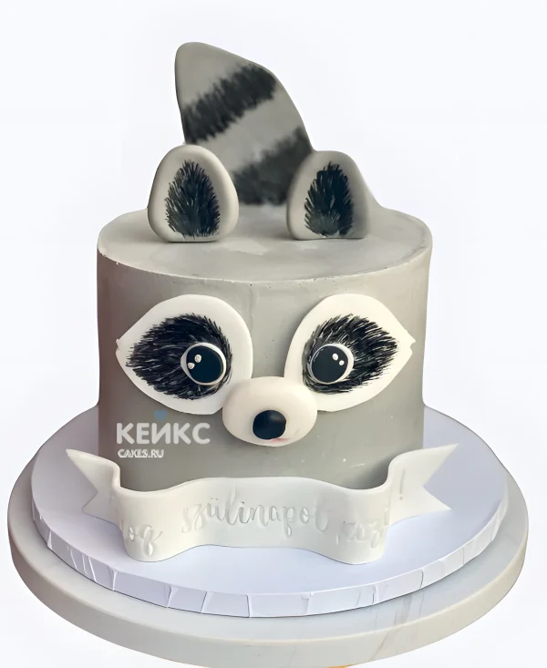 Торт с енотом и надписью на ленточке Фото