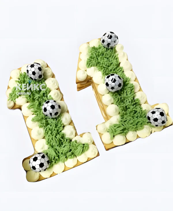 Торт 3D в виде цифры на 11 лет с футбольными мячами Фото