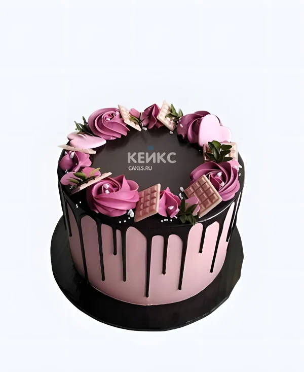 Великолепный торт девушке на 20 лет с шоколадками и кремовыми цветами Фото