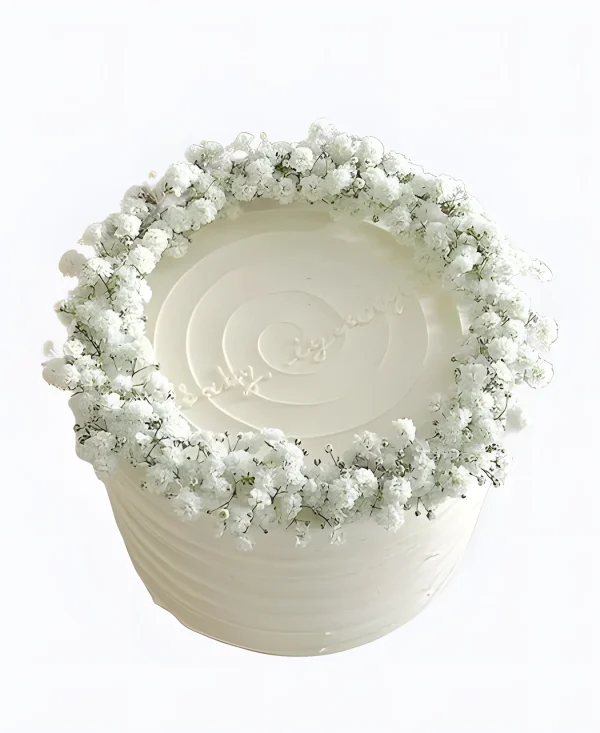 Белоснежный торт с цветочками Фото