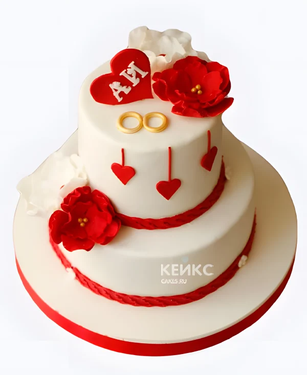 Белый свадебный торт с красными цветами инициалами и кольцами Фото