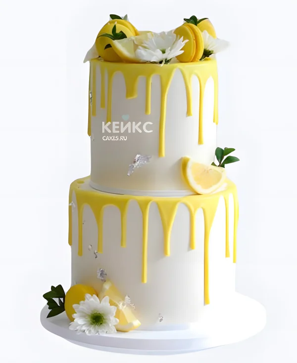Белый свадебный торт с желтыми подтеками лимоном и хризантемами Фото