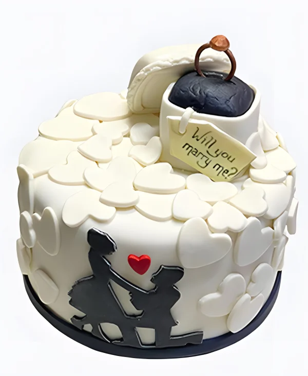 Белый торт с кольцом и сердечками на сватовство Фото