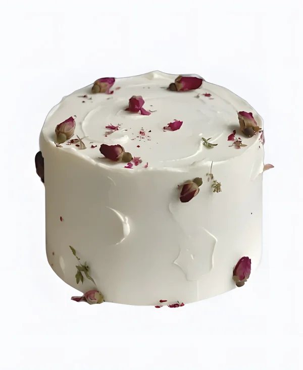 Белый торт с красными бутонами роз Фото