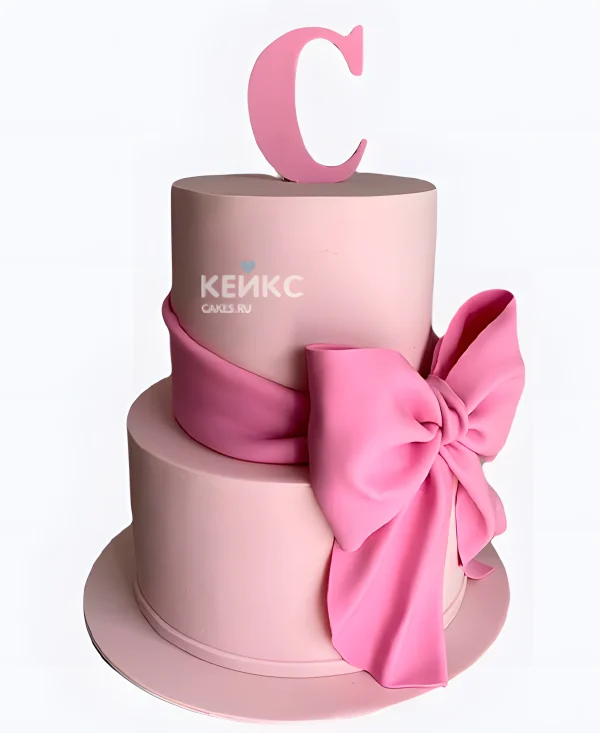 Двухъярусный торт девочке с большим розовым бантом Фото