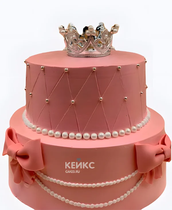 Двухъярусный торт девочке с короной и бантиками Фото