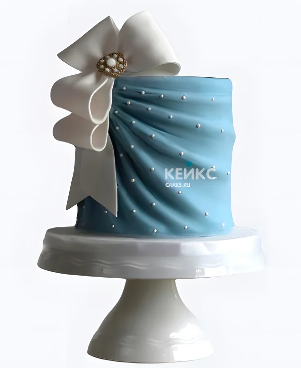 Эстетичный голубой торт девочке с белым бантом Фото