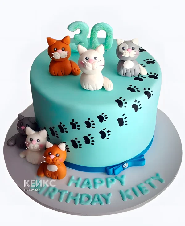 Голубой торт девочке с фигурками котиков Фото