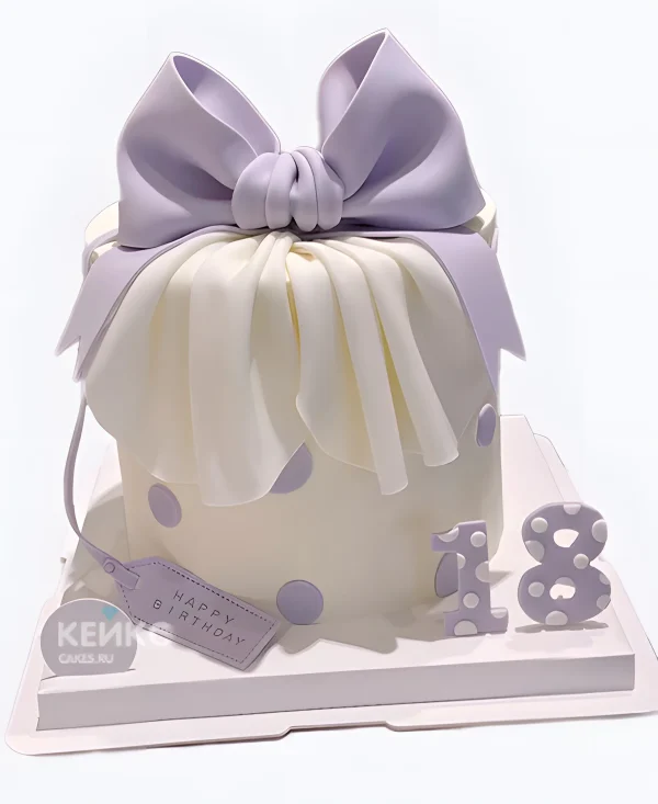 Изящный торт девочке с сиреневым бантом Фото