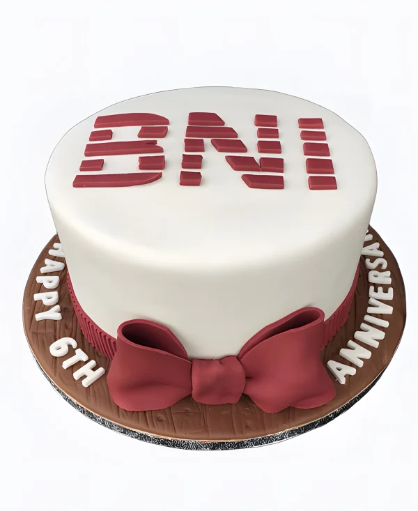 Корпоративный торт с красным бантом Фото