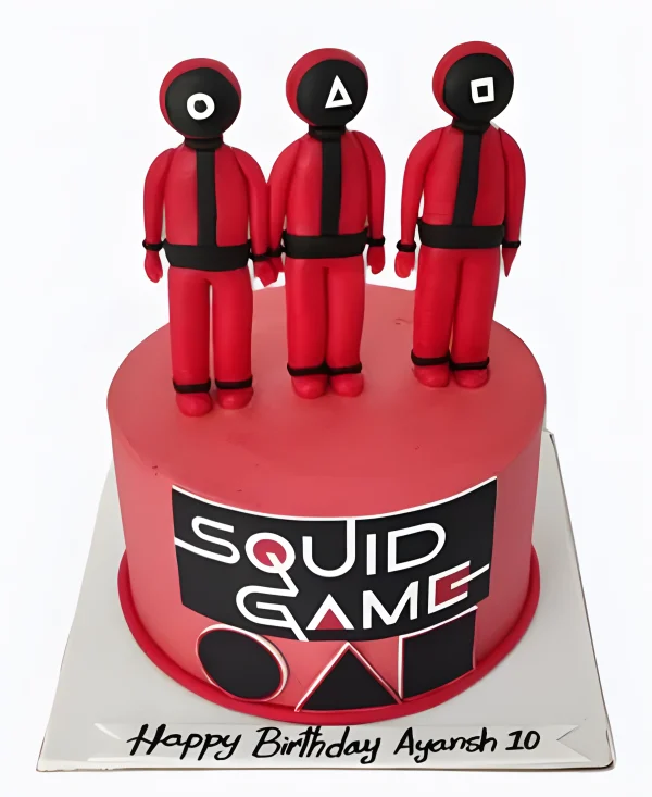 Красный торт с фигурками Игра в кальмара Фото