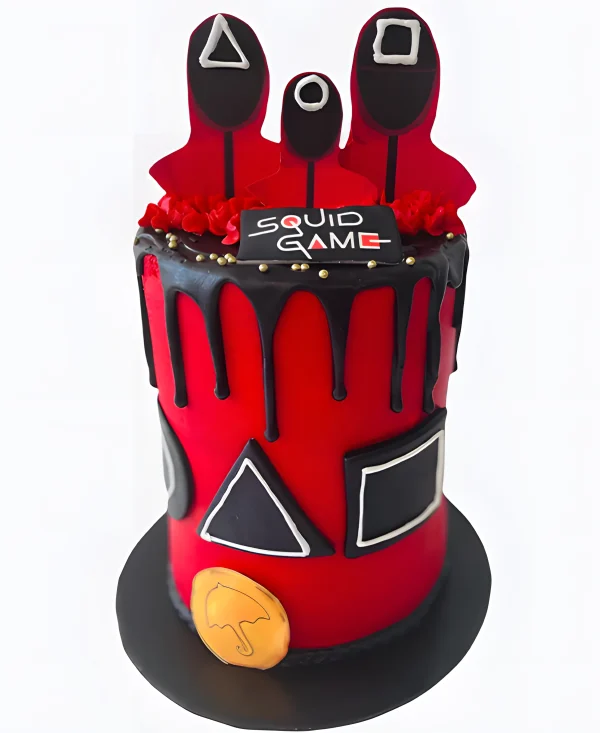 Красный торт с шоколадными подтеками Фото