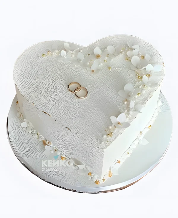 Круглый свадебный торт Кольца в сердце Фото
