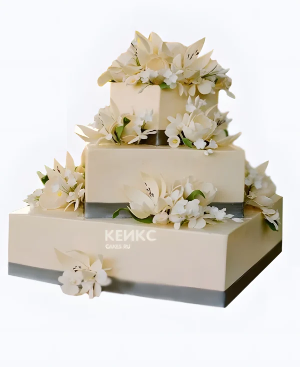 Квадратный свадебный торт с лилиями и серой ленточкой Фото